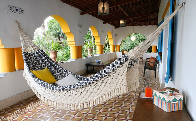 Navy and White Jacquard Hand Woven Hammock on Patio